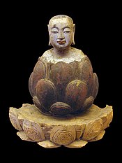 Lótuszból kiemelkedő fiatalkori Buddha